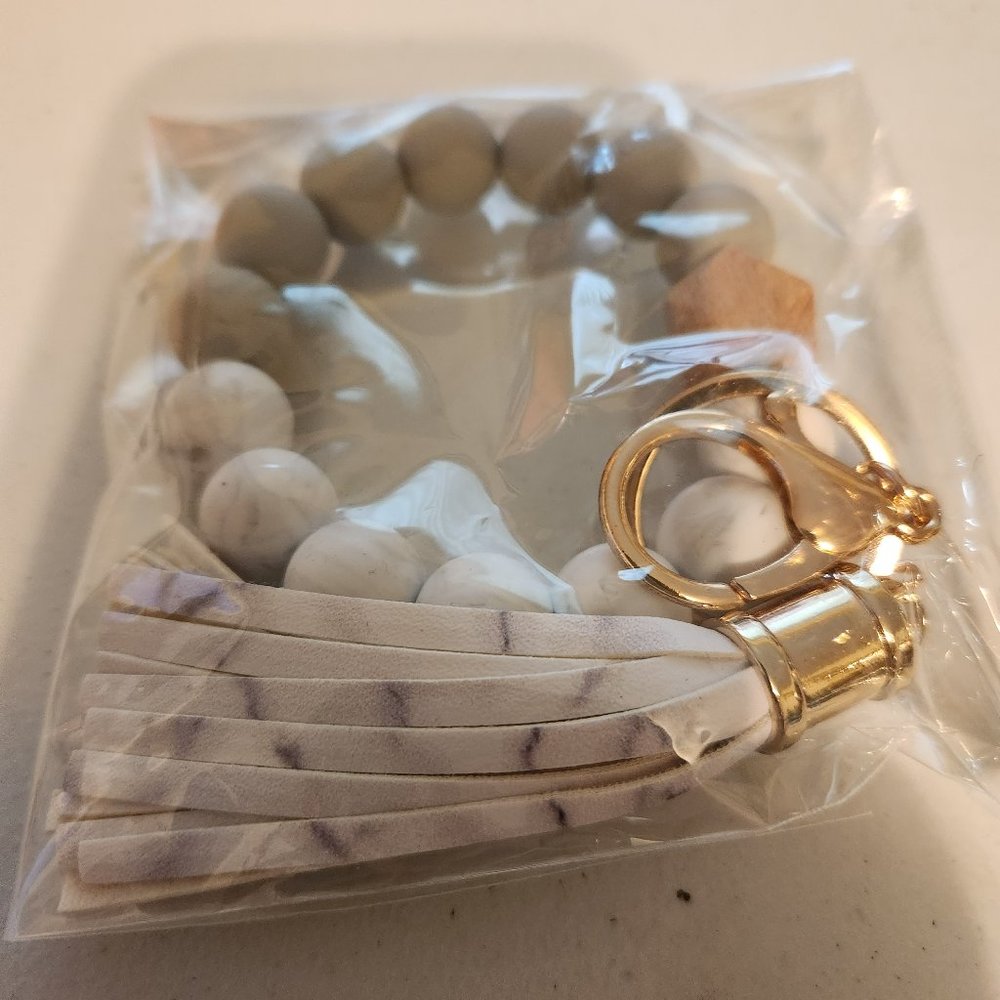 Silicone ladies bracelet and keychain.